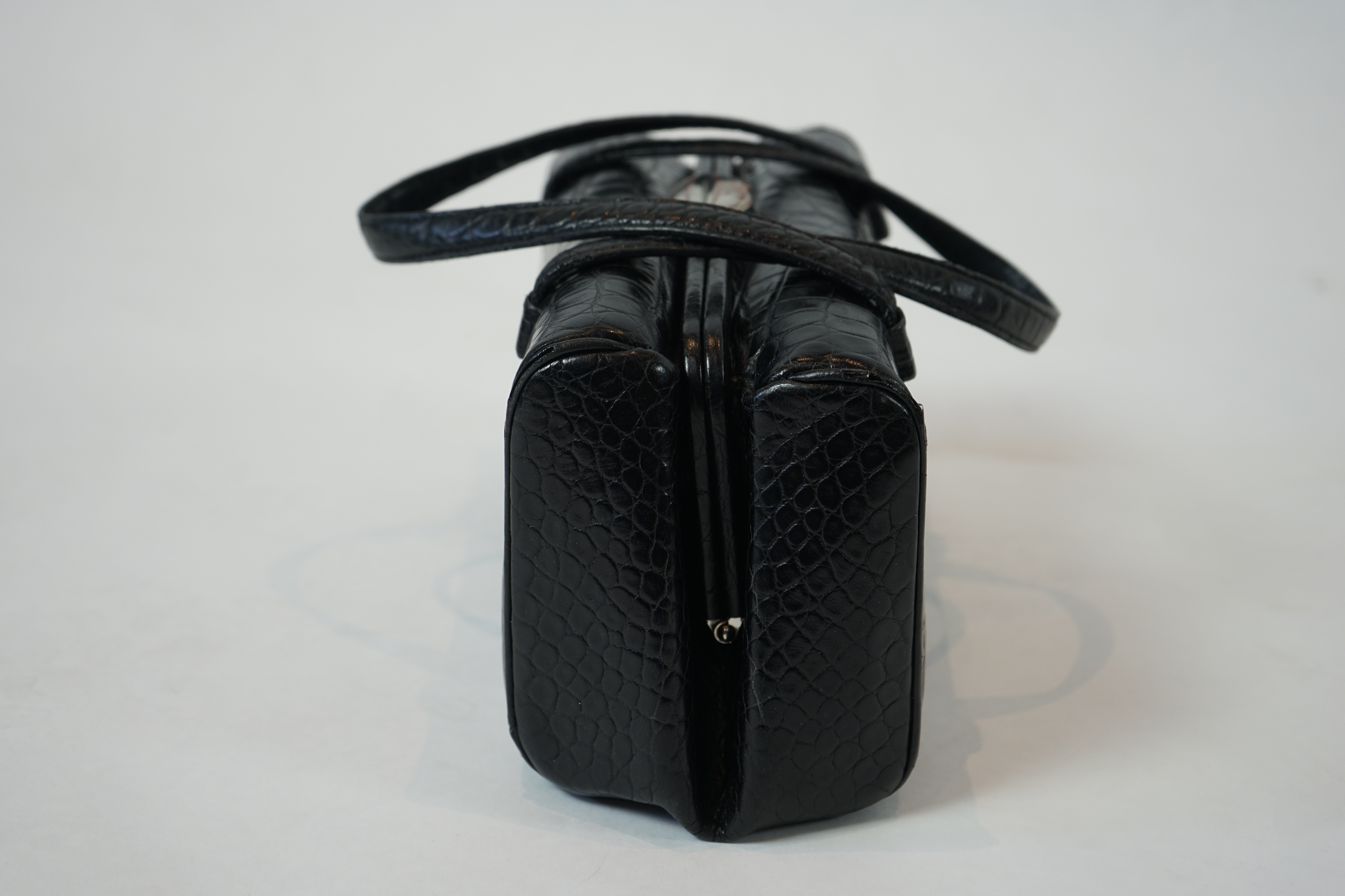 A vintage Lulu Guinness black leather mock croc handbag